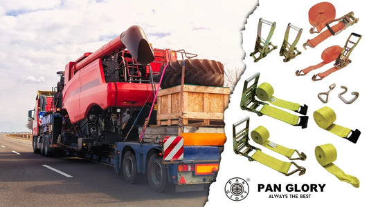 Heavy machinery secured on a flatbed trailer alongside industrial cargo securement equipment including ratchet straps and hooks